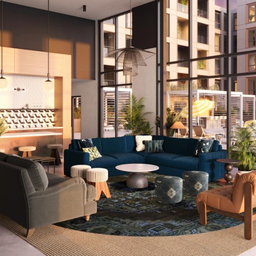 a modern looking lounge room with large windows and seating