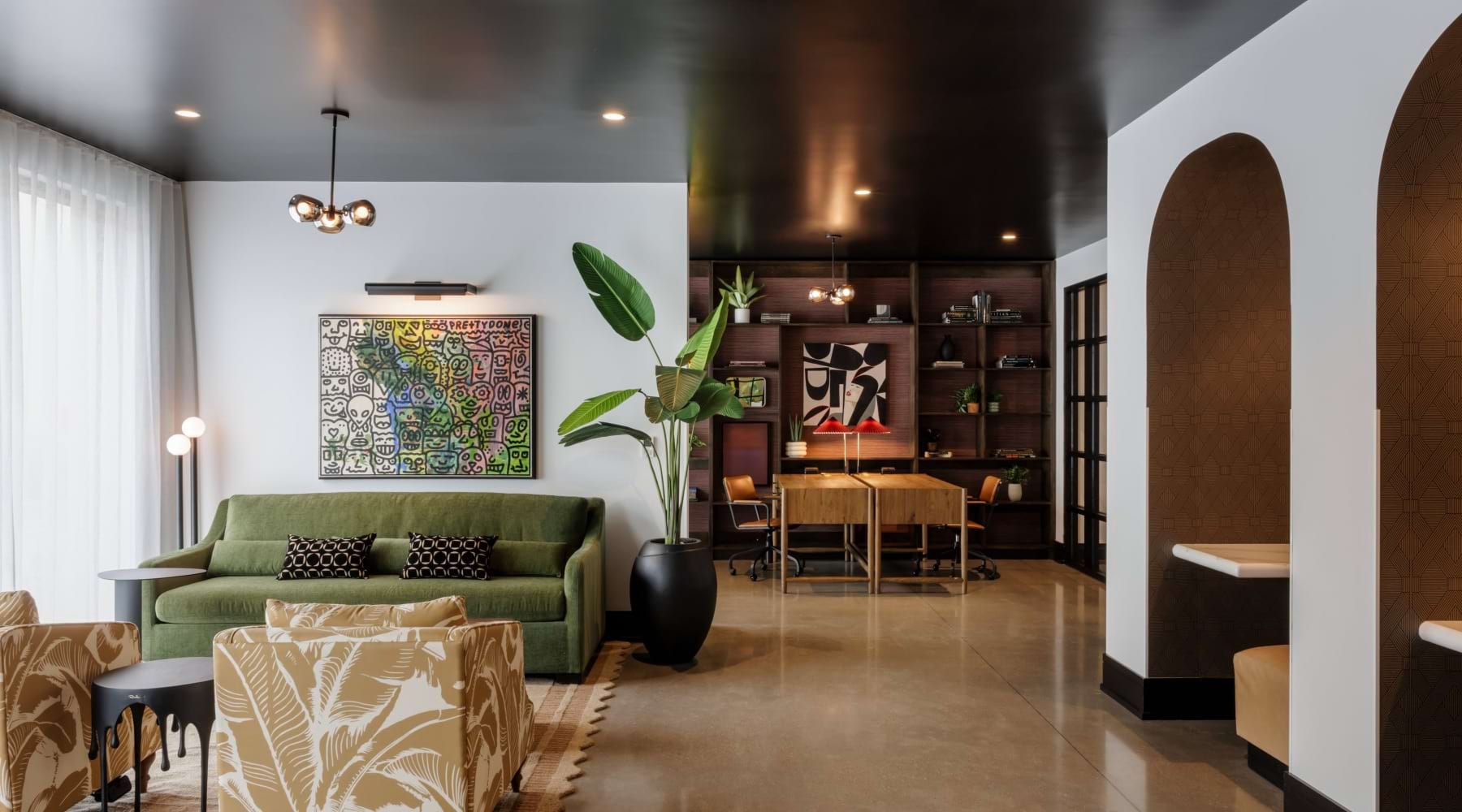 Lounge with Couch and Alcoves for Work Areas