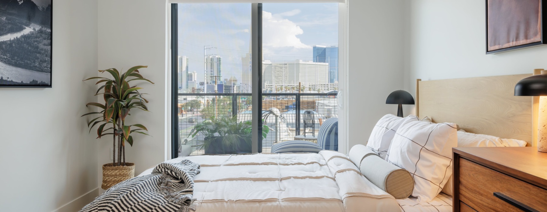 Bedroom with skyline in background