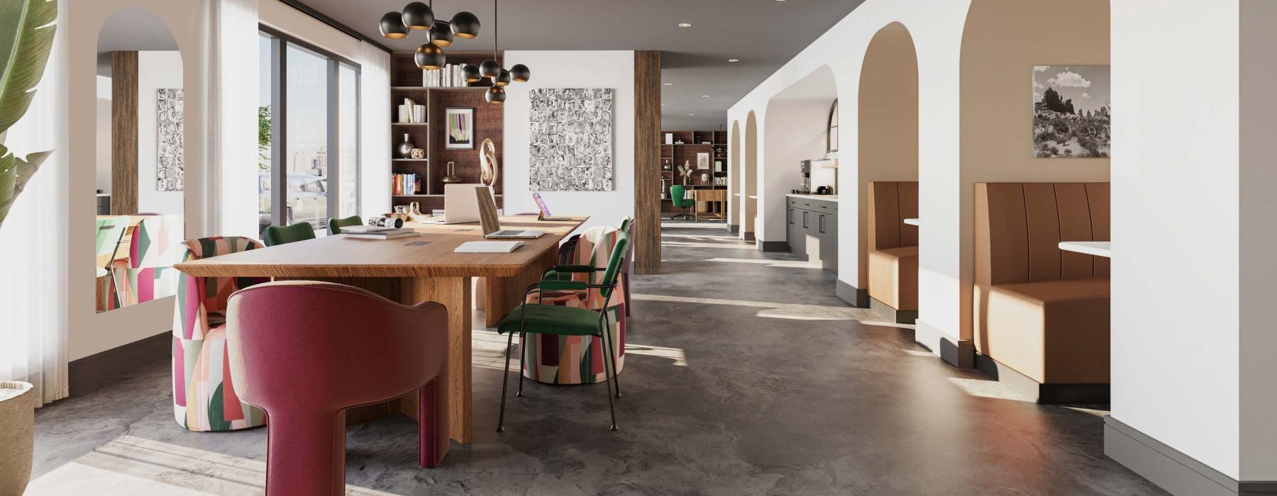 a work room with a table chairs and booths