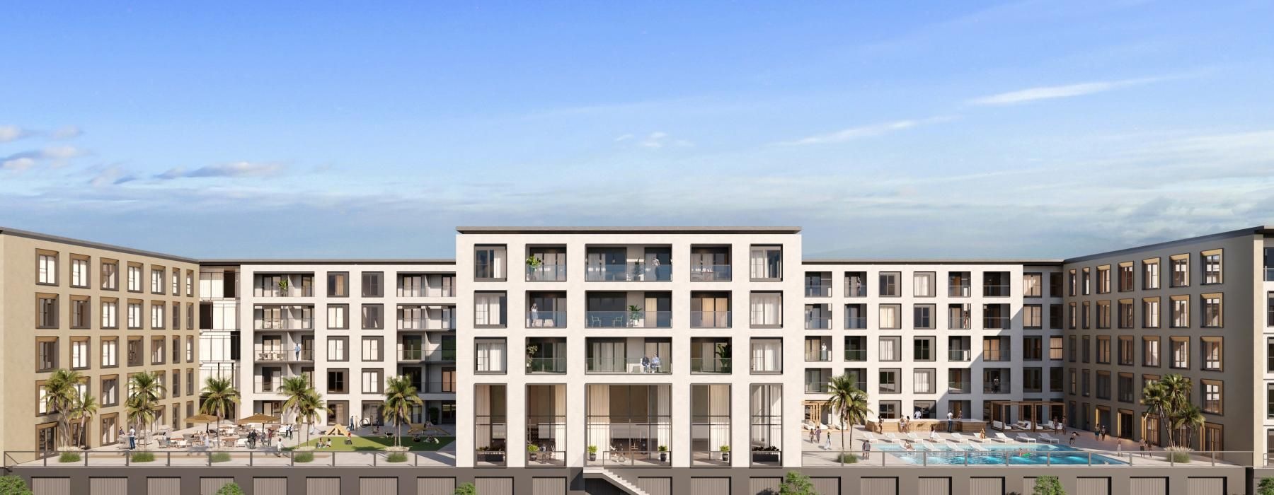 a building with many windows and a pool