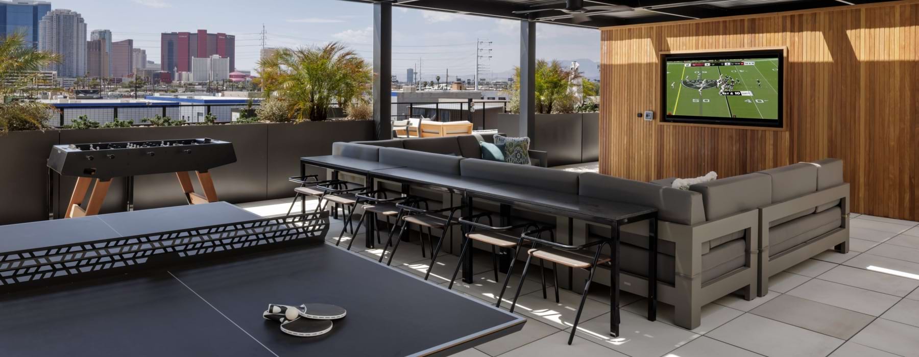 Outdoor lounge with ping pong and views