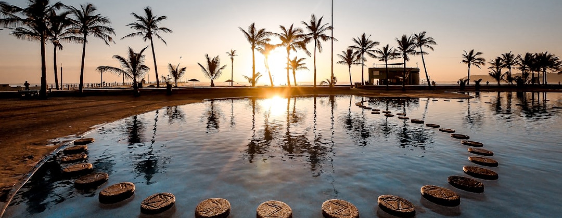 resort style pool with cabanas at sunset - Resort style apartment living