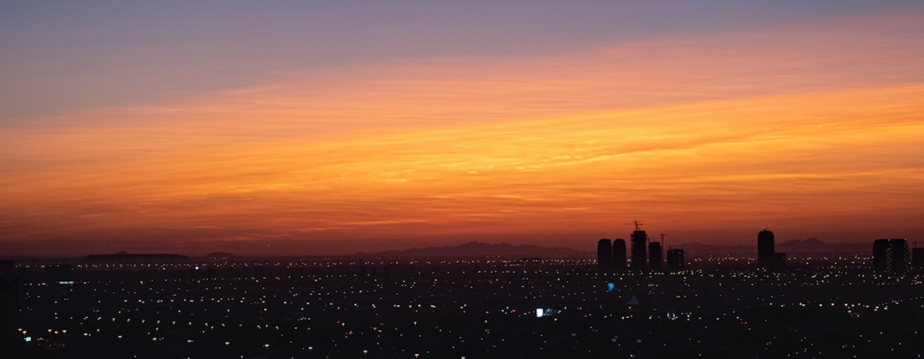 Downtown Las Vegas skyline at dusk - apartments near downtown las vegas