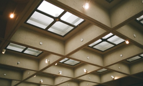 modern loft interior with high ceilings and large windows - Modern lofts for rent