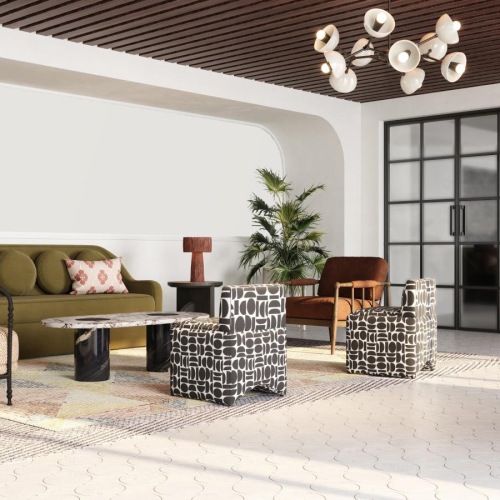 a lounge room with a couch and a table and chairs